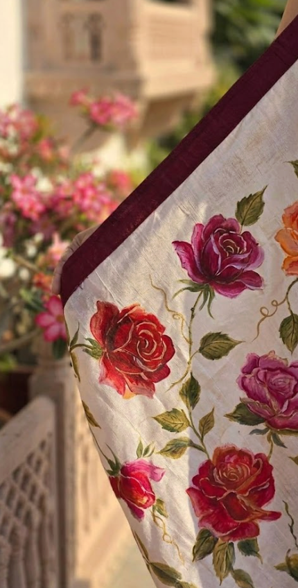 Crimson & Amber Rose Hand-Painted Pure Silk Saree in Soft Ivory